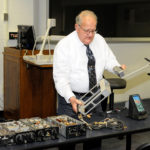 The alumnus invented, manufactured and marketed slide-in adapters to retrofit new radios in older aircraft, a cost-saving innovation that he demonstrated for students.