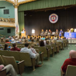 Family and friends gather in a venue befitting the students' achievement.