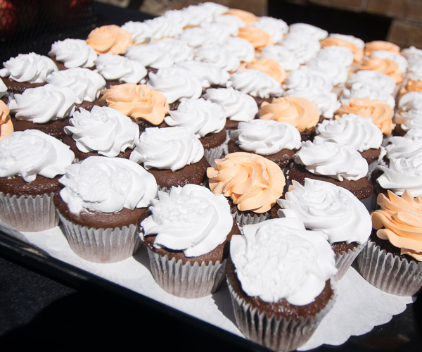 Save room for dessert – cupcakes adorned with orange, the chosen color for hunger-awareness efforts.