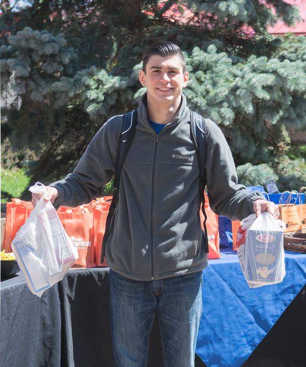 Food donations are hand-delivered by R. Colby Janowitz, a culinary arts and systems student from Westminster, Md.
