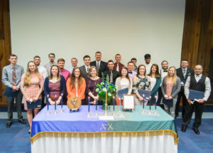 A number of this year's Alpha Chi inductees attend a ceremony in the PDC.