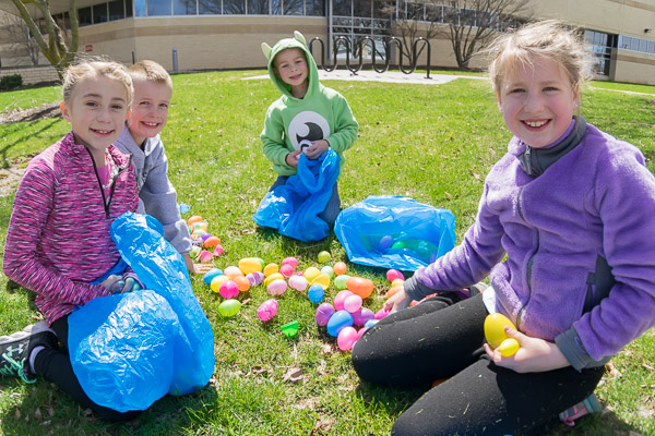 Young egg-hunters assess the day's impressive haul.