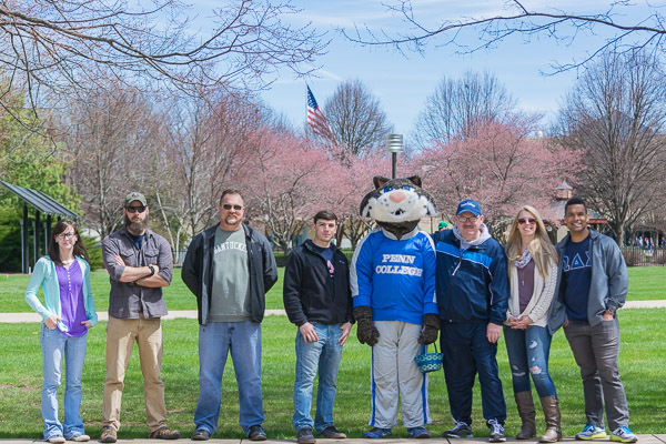 Team Wildcat, reporting for duty. From left are students Emily J. Jones, Jon R. Hallingstad Jr., Michael D. Seitzer and Alex C. Paris; the college mascot (in the person of student Efrem K. Foster); Chet Beaver, financial aid specialist, veterans services; and students Jennifer L. Nicholson and Bradly M. Lantz.