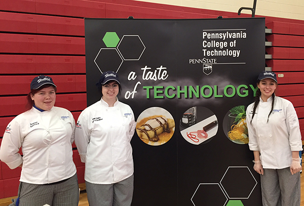 Hospitality-plus is exhibited by (from left) Safford and baking and pastry arts students Keegan D. Sonney, of Erie, and Maren A. Zaczkiewicz, of Williamsport. They were accompanied in their demonstrations by Chefs Frank Suchwala and Todd M. Keeley, Penn College faculty members.