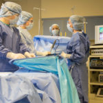 Surgical technology students simulate a laparoscopic gall bladder removal.