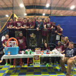 Phi Mu Delta gathers to celebrate a successful charity fundraiser at the Elmira Street attraction.