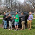 Members of the planning committee paint The Rock in advance of Pride Week activities. From left are Lloyd A. Shope, Catherine E. Gamez, Kyle T. Pechtold, Michael D. Penwell and Trevor I. Brandt.