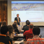 Roy A. Fletcher, assistant professor of business administration/banking and finance, talks with Stock Market Challenge participants from area high schools about the future of artificial intelligence in accounting. The School of Business & Hospitality hosted the grand finale celebration for the Stock Market Challenge, an annual competition for Lycoming County high schools and middle schools that is sponsored by the Williamsport Sun-Gazette.