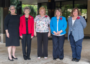 Four of the year's retirees gather with President Davie Jane Gilmour on Thursday morning outside Le Jeune Chef Restaurant. From left are the president, Sharon L. Truax, Marion C. Mowery, Patricia L. Bilbay and Judith A. Fink.