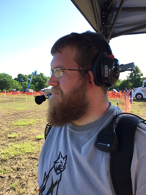 Logan B. Goodhart, president of the Baja SAE Club, monitors the action.