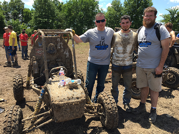 Penn College Baja co-captains Clinton R. Bettner (left) and Goodhart flank team driver Capps after the Wildcats' fifth-place finish in the endurance race. 
