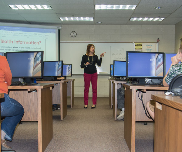 Michele M. Budnovitch, instructor of business administration/health information technology, helps students to conceptualize the field of health information.