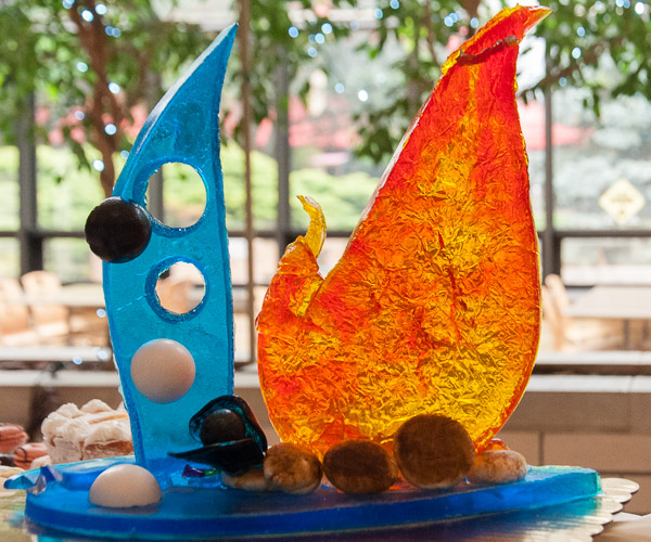 Befitting the event’s “Four Elements” theme, Santaella’s sugar sculpture gives visual cues to all: air, water, earth and fire.