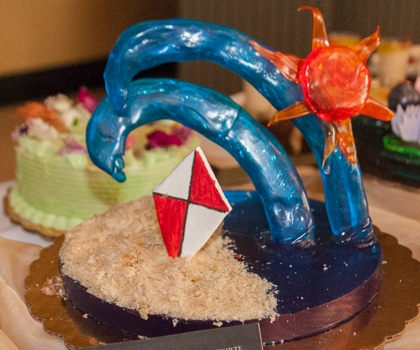 Earth, water, air and fire are packaged neatly in a beachy sugar art centerpiece by McGuire.