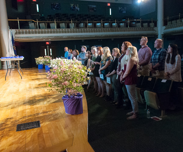Inductees recite the society’s pledge …