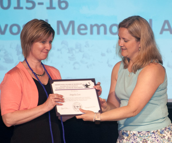 Pennsylvania College of Technology nursing student Angela R. Lee, of Roaring Branch, accepts a certificate of membership to the college’s Bachelor of Science Nursing Honor Society.