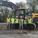 Grouped near a Volvo excavator at the training site, alongside the West Branch of the Susquehanna River south of the Schneebeli Earth Science Center, are (from left): Flood, Breon, Peck, Hoffman, Witmer and Justin W. Beishline, assistant dean of transportation and natural resources technologies.