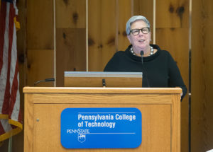 Penn College President Davie Jane Gilmour talks with Youth Leadership graduates in the Thompson Professional Development Center.