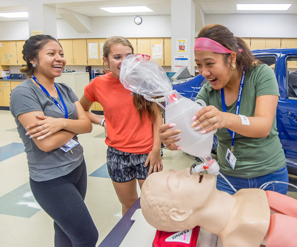Girls in Health Careers Camp gleefully explore the lifesaving world of emergency medicine.