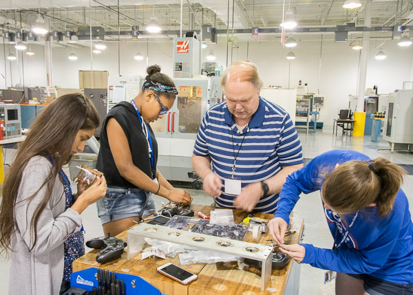 Eric K. Albert, associate professor of machine tool technology/automated manufacturing, runs a troubleshooting and repair station in the Automated Manufacturing Lab, where girls tested – and retested – their quadcopter chassis designs as the camp progressed. Albert was one of three instructing the SMART Girls throughout the camp. Joining him were Alice Justice, a school counselor for Central Columbia School District, and John Doctorick, of the Carnegie Science Center.