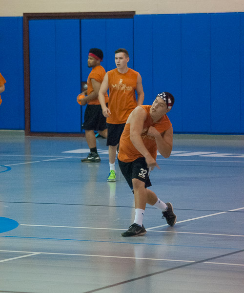 The orange-shirted warriors from Lancaster/York mix it up in the dodgeball arena.