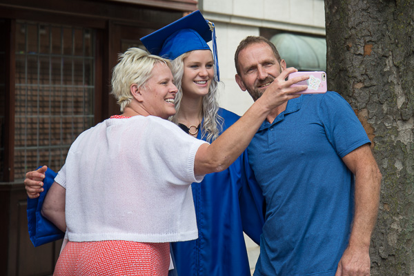 A sweet moment to grab a family selfie