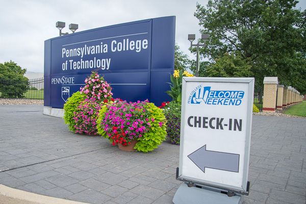 Welcoming signs guide families to the first order of business.