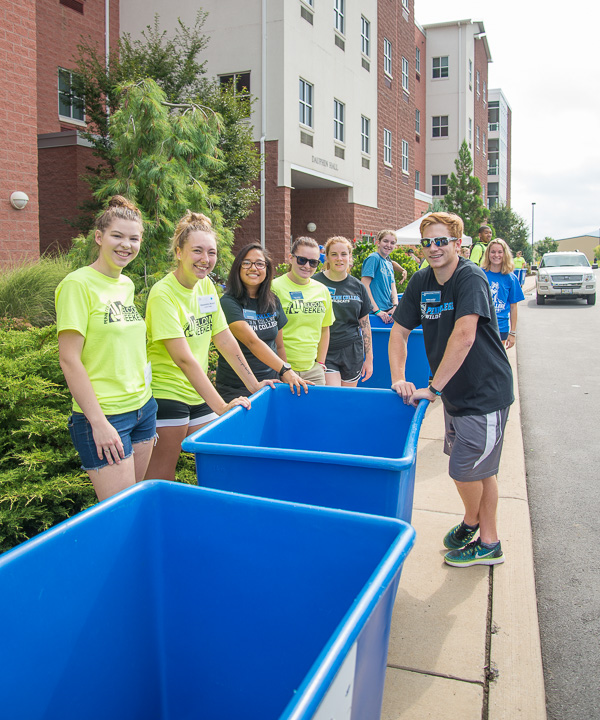 A long line of happy helpers