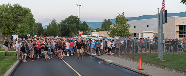 On-campus and commuter students commingle for the march down College Avenue to Rose Street Commons.