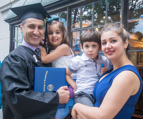 Physician assistant grad Nasser Tajiani, recipient of the Board of Directors Award, celebrates with his family.