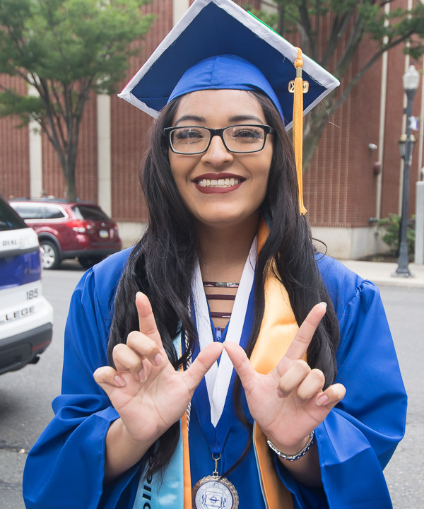 Cindy M. Ruiz, a surgical technology major and student leader in the Minorities Lending Knowledge organization, shares her winning smile on the happiest of occasions.