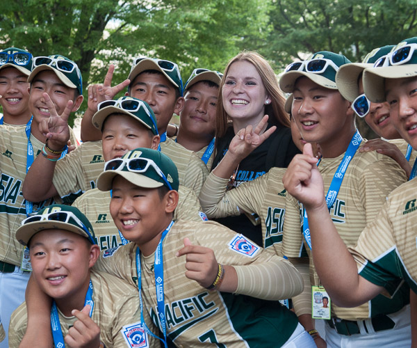 Erin N. Shaffer, a basketball player from Williamsport, is surrounded by players from the Asia-Pacific team.