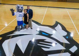 Carolyn R. Strickland, vice president for enrollment management and associate provost, and Elliott Strickland, vice president for student affairs, are providing funding for two new Wildcat mascot outfits at Penn College. The mascot outfits are based on the new Wildcat Athletics logo, seen here at center court in Bardo Gymnasium.