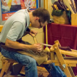 Woodcarver Liam M. McCay, an applied technology studies major from Bloomsburg, offers a live demo of his time-honored craft.