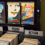 Movie posters are artfully repurposed as notebook covers.