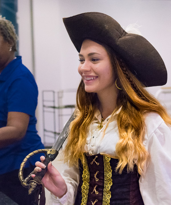 Fittingly dressed for the occasion, which coincided with International Talk Like a Pirate Day, is Jessica L. Cavanaugh, a health information technology student and substitute Dining Services worker ...