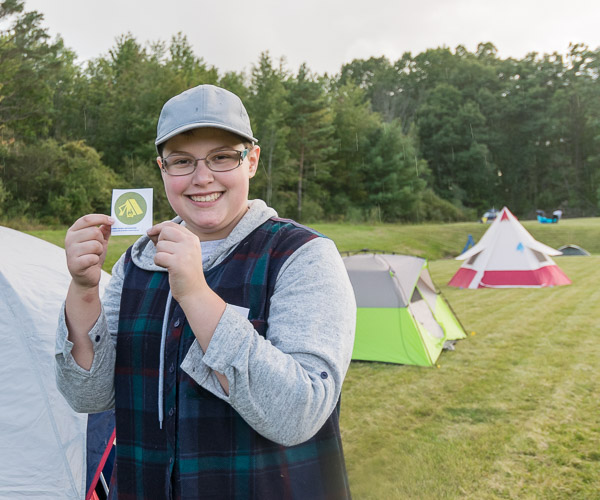 Baking and pastry arts student Emma M. Mikulecky, of Williamsburg, adds an outdoorsy badge to her toolbox of life skills.