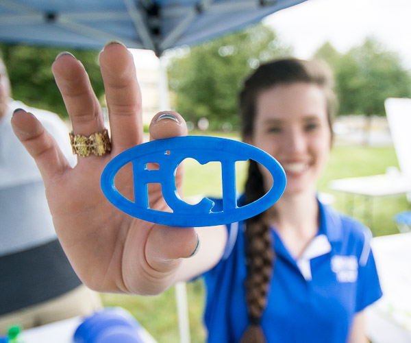 Sapphire E. Naugle, a plastics and polymer engineering technology student, shows off a keychain made of her favorite material.