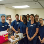 Students in one of four Adult Health Nursing I labs take their turn administering flu shots in College Health Services. From left are Covone, a student from Bellefonte; Harbaugh; and students Merrill, of Williamsport; Danita M. Robinson, of Watsontown; Ryan E. Reid, of Linden; Dreese, of Selinsgrove; Crystal S. Pearson, of Muncy; and Jessica L. Yoder, of Watsontown.