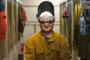 The welding skills of Robert S. Barnes, a Penn College student from Montoursville, saved the day for participants and spectators at a recent tractor pull event in the area. (Photo by J.J. Boettcher, student photographer)