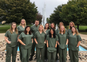Penn College surgical technology students gather to celebrate National Surgical Technologists Week. Front row (from left) are Amanda A. Crevier, of Fairfield; Brianna N. Tucker, of Scranton; Megan E. Berdanier, of Pottsville; Torri M. Johnson, of Smethport; Krysten M. Miller, of Robertsdale; and Breana N. Miller, of Pittston. Second row (from left) are Carissa M. Neece, of Williamsport; Alex J. Donati, of Kutztown; Anna G. Thompson, of Mount Carmel; Alexis I. Ashby, of Williamsport; Brittany R. Hartman, of Myerstown; and Miriam Brooke R. Minium, of Montoursville.