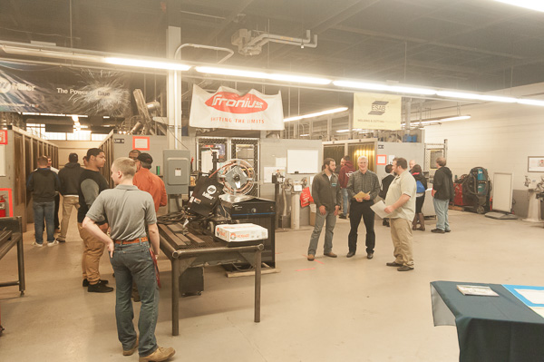 The welding lab (along with nearby instructional space for machining) collaborate on promoting the college's forthcoming associate degree in metal fabrication technology.