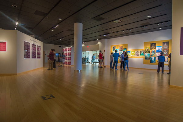 In addition to alumni, graphic design students and their families enjoyed the colorful venue of the art gallery on the third floor of the Madigan Library. 