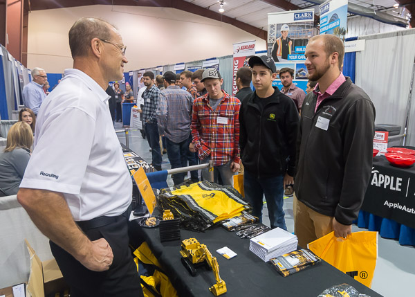 ... where Randy L. Fetterolf, of Cleveland Brothers Equipment Co., a longtime institutional benefactor, talks with diesel technology major Gavin P. Seip, of New Ringgold.