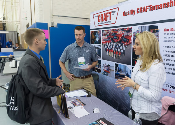 Alumnus James P. Craft ('09, construction management) and Jessica Craft – both of James Craft and Son Inc. – meet with Kyle X. Beam, a welding and fabrication engineering technology major from New Freedom.