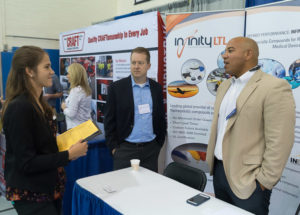 During Penn College’s Fall Career Fair, Sidney C. Trunzo (left), of Williamsport, a plastics and polymer engineering technology student, meets with James Figaniak (center) and Raphael Delgado (a Penn College alumnus), of Infinity LTL Engineered Compounds.