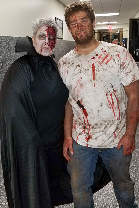 President Davie Jane Gilmour and Tristan A. Eichfeld, a welding and fabrication engineering technology major from Elmer, N.J., scare up an awesome get-up for their ghastly gig in the Arc Asylum. (Photo provided)