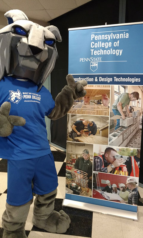 The college's mascot points out some of the career possibilities in the School of Construction & Design Technologies.