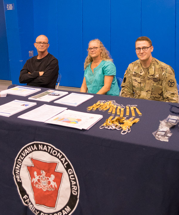 Guston J. Bird (right), who holds two information technology degrees from Penn College, returns to campus as a chaplain with the Pennsylvania National Guard Family Program.