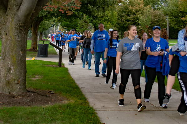 A river of Wildcat blue, fueled by goodwill, flows along the campus mall.